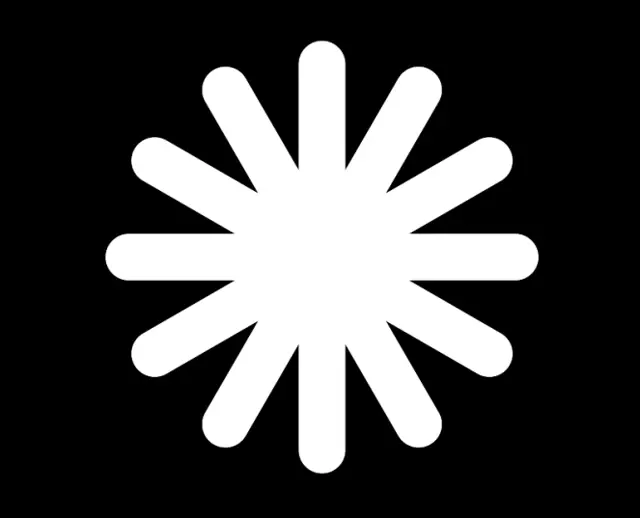 White asterisk burst of rounded spokes radiating from the centre of a black frame