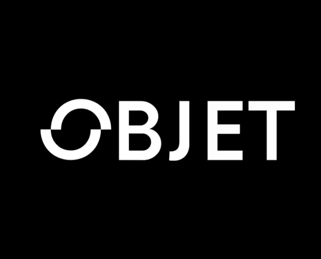 The word OBJET in white caps on black, its O built from a ring split by two notches